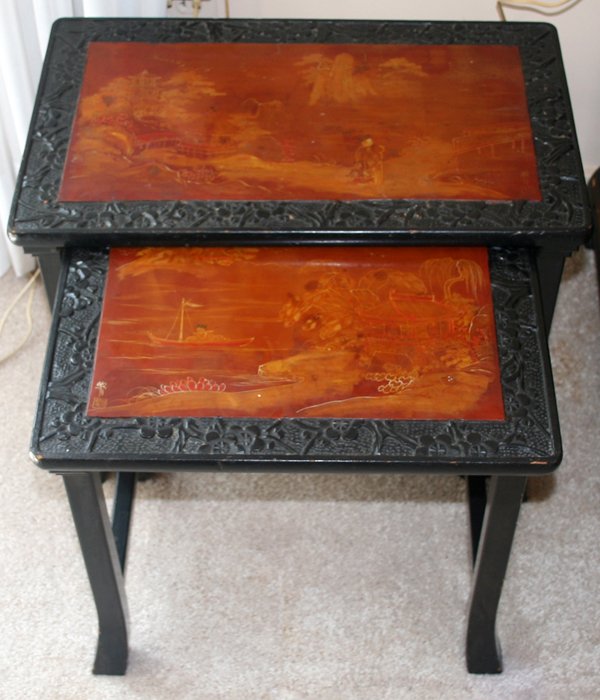 CHINESE EBONIZED WOOD NEST OF TWO TABLES, H 17": CHINESE EBONIZED WOOD NEST OF TWO TABLES, H 17", W 22":Signed (see photo). Measures H.17 1/2" x 22" x 13".