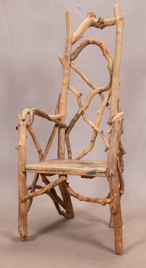 BEN FORGEY, CHAIR, REPURPOSED WOOD & BRANCHES H 53" W: BEN FORGEY, CHAIR, REPURPOSED WOOD & BRANCHES H 53" W 22" 53" x 22" x 19". "Property from the sale of unaccessioned items from the Estate of James Van Sweden for the purpose of benefiting the Universi