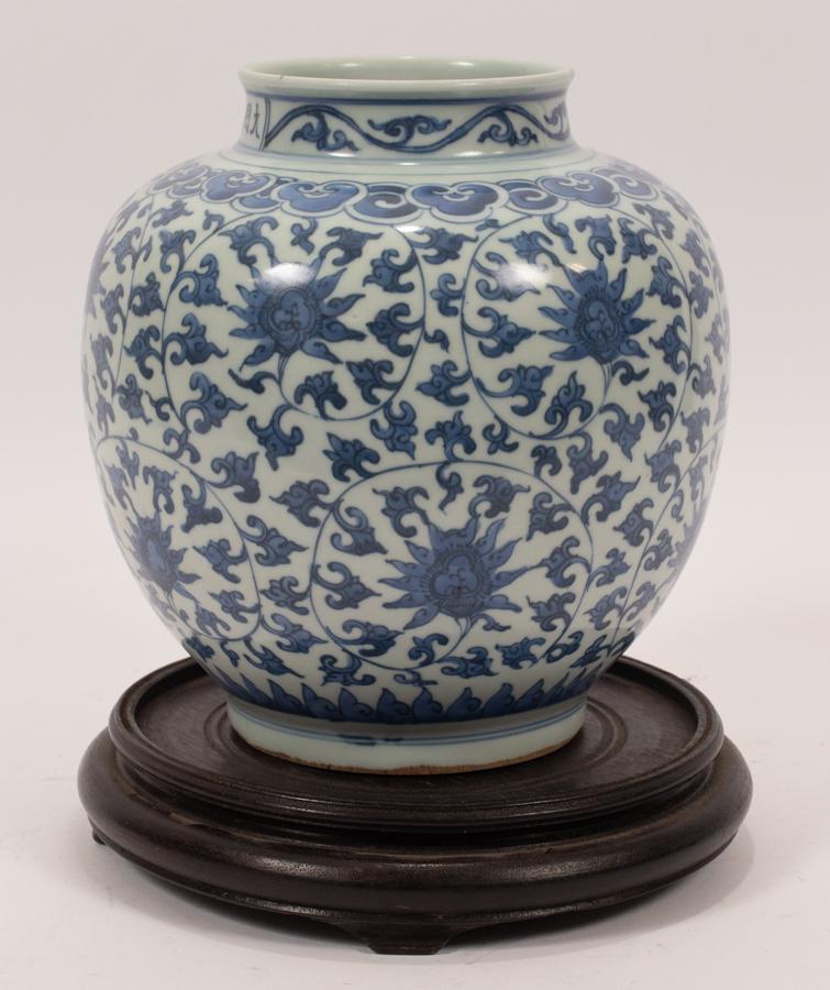 CHINESE BLUE & WHITE PORCELAIN JAR, H 8.5", DIA 8": CHINESE BLUE & WHITE PORCELAIN JAR, H 8.5", DIA 8" A Chinese blue and white porcelain jar. Having a Mah John Oriental Antiques (New York) paper label to the underside. Accompanied with stained wood st