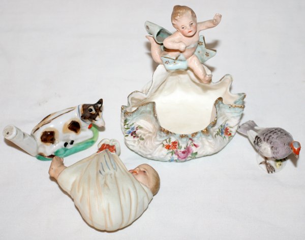 BISQUE, MEISSEN, STAFFORDSHIRE FIGURES, ANTIQUE: BISQUE, MEISSEN, STAFFORDSHIRE FIGURES, ANTIQUE, H 4",3",2":Baby in blanket signed under head. H 2 1/2", W3". Meissen turkey, H2 1/4", W2 1/2". Staffordshire cow whistle H2", W3". European hand painte