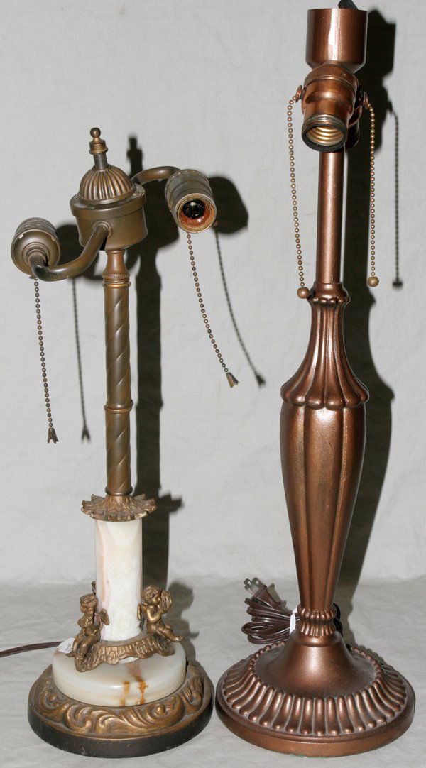 ONYX & BRASS & PATINATED METAL LAMPS, 20TH C: ONYX & BRASS & PATINATED METAL LAMPS, 20TH CENTURY, TWO, H 19 1/2" & 22":Including 1 onyx and brass two light lamp with figures of cherubs playing harps around the base H. 19 1/2" together with 1 pati
