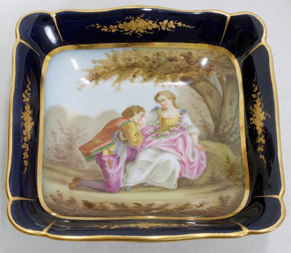 SEVRES COMPOTE, C. 1850, CHATEAU DE TUILLERIES: SEVRES COMPOTE, C. 1850, H 3", W 8", CHATEAU DE TUILLERIES:Sevres porcelain compote having a square bowl with hand-painted courting scene at the well, bordered in cobalt blue with fired gold roses, ra