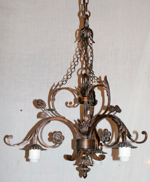 ITALIAN ANTIQUED BRONZE PATINA CHANDELIER H 28": ITALIAN ANTIQUED BRONZE PATINA THREE LIGHT CHANDELIER, H 28", DIA 21":Leafy design.