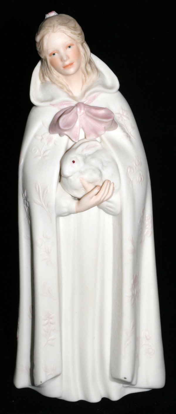 CYBIS BISQUE FIGURE, 'MELISSA', H 10": CYBIS BISQUE FIGURE, 'MELISSA', H 10":Wearing cloak and holding rabbit.