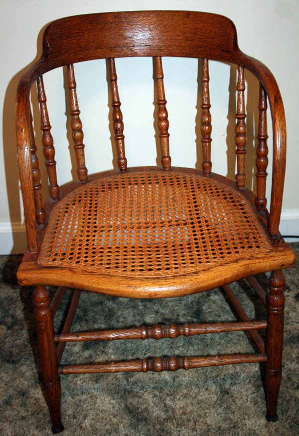 080239 AMERICAN ANTIQUE OAK AND CANE CAPTAIN'S CHAIR Aug 14, 2009
