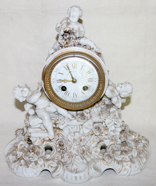 GERMAN PORCELAIN CLOCK, H 13", W 12", 19TH C.
