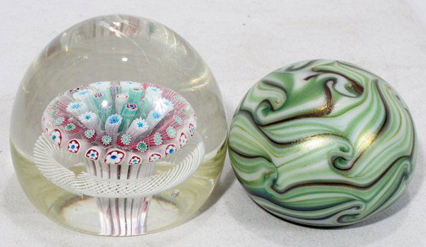 ORIENT & FLUME PAPERWEIGHT & CANE PAPERWEIGHT: ORIENT & FLUME PAPERWEIGHT & CANE PAPERWEIGHT, DIA 3":Including 1 Orient & Flume iridescent glass paperweight, signed, Dia.2 3/4" (good condition), and 1 other hand-blown glass paperweight with cane m
