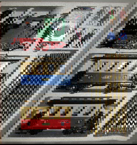 LGB "G" SCALE "THE BIG TRAIN", C.1980: LGB "G" SCALE "THE BIG TRAIN" INCLUDES ENGINE AND TWO CARS, C.1980, APPROX. 30 PCS WITH TRACK:approx 20 pcs of extra track. In original box with instruction booklet, transformer, passenger and conduct