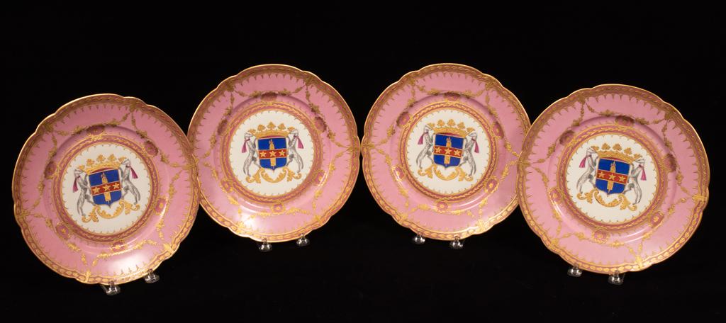 FRENCH SEVRES PORCELAIN ARMORIAL PLATES, C. 1910, 4: FRENCH SEVRES PORCELAIN ARMORIAL PLATES, C. 1910, 4 PCS, DIA 10.5"A collection of four French Sevres porcelain plates circa 1910. Each having a pink border with a mink flanked crest to the center. Emb