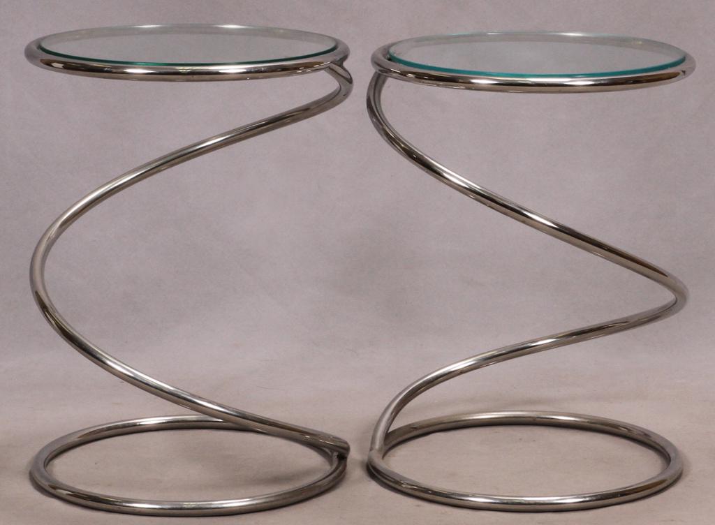 ATTRIBUTED TO MCM PACE SPRIAL FORM STAINLES STEEL END: ATTRIBUTED TO MCM PACE SPRIAL FORM STAINLES STEEL END TABLE PAIR, H 18" DIA 13" Each with a circular glass top. Estate of Jack Faxon, Birmingham, MI. Michigan Senator and creator of the Michigan Counc