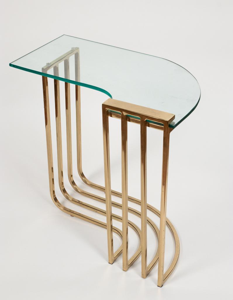 CONTEMPORARY GLASS AND BRASS SIDE TABLE H 20" W 22" L: CONTEMPORARY GLASS AND BRASS SIDE TABLE H 20" W 22" L 14" Estate of Jack Faxon, Birmingham, MI. Michigan Senator and creator of the Michigan Council for the Arts.
