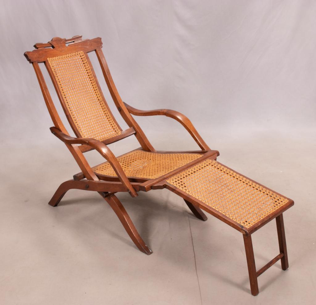 OAK AND CANE FOLDING CHAISE, COLLIGNONS, 1871: OAK AND CANE FOLDING CHAISE, COLLIGNONS, 1871 Stamped "Collignons. patent 1871". Provenance: Estate of Jack Faxon, Michigan Senator and creator of the Michigan Council for the Arts.