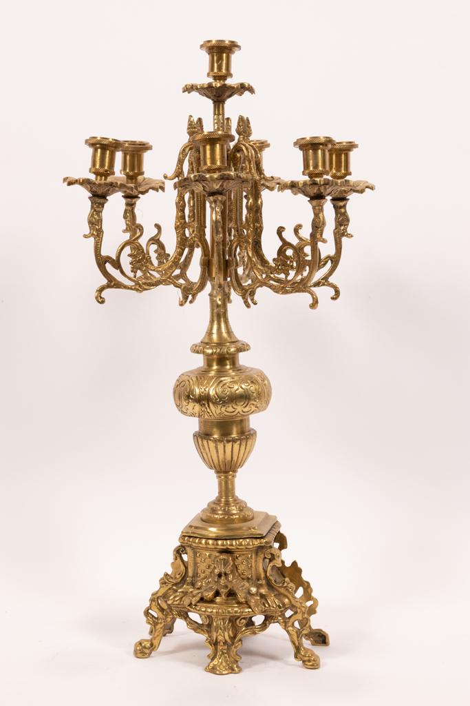 FRENCH BRONZE CANDELABRUM, C 1900 H 23", DIA 10": FRENCH BRONZE CANDELABRUM, C 1900 H 23", DIA 10"A circa 1900 brass candelabrum. Offers six arms and seven total candle cups. Details include hoof feet, masks, grape bunches. One piece.