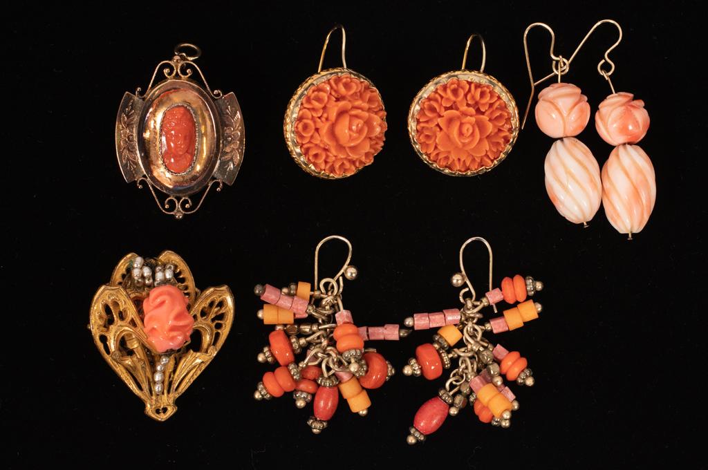 COSTUME JEWELRY, CORAL EARRINGS 5 PCS.: COSTUME JEWELRY, CORAL EARRINGS 5 PCS. Miriam Haskell brooch, one pendant, one pair of carved drop pendant earrings, 2 pairs costume earrings, one costume pendant.