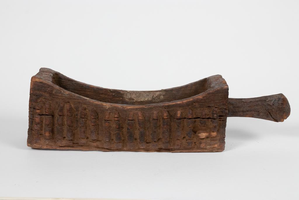 DOGON, AFRICAN, CARVED WOOD RITUAL TROUGH H 7" L 24" D: DOGON, AFRICAN, CARVED WOOD RITUAL TROUGH H 7" L 24" D 5" Estate of Jack Faxon, Birmingham, MI. Michigan Senator and creator of the Michigan Council for the Arts.