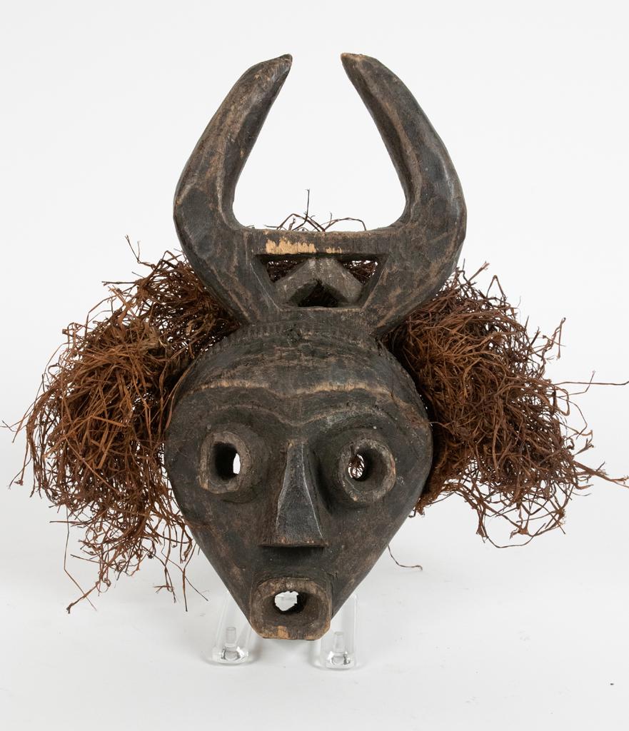 PENDE MBUYA, CONGO AFRICAN, CARVED WOOD AND FIBER,: PENDE MBUYA, CONGO AFRICAN, CARVED WOOD AND FIBER, MORALITY PLAY MASK H 12" W 7" Estate of Jack Faxon, Birmingham, MI. Michigan Senator and creator of the Michigan Council for the Arts.
