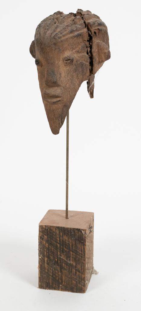 ORON, NIGERIA AFRICAN, CARVED WOOD ANCESTOR FIGURE'S: ORON, NIGERIA AFRICAN, CARVED WOOD ANCESTOR FIGURE'S HEAD H 7.5" W 6" D 6" Estate of Jack Faxon, Birmingham, MI. Michigan Senator and creator of the Michigan Council for the Arts.