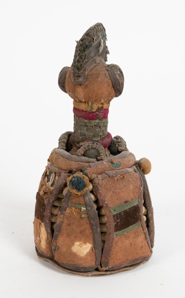 YORUBA, NIGERIAN, AFRICAN, CARVED WOOD, PLANT FIBER,: YORUBA, NIGERIAN, AFRICAN, CARVED WOOD, PLANT FIBER, HIDE AND COWRIE SHELLS IBORI (INNER HOUSE OF THE HEAD) H 7" DIA 3.5" Estate of Jack Faxon, Birmingham, MI. Michigan Senator and creator of the Mich