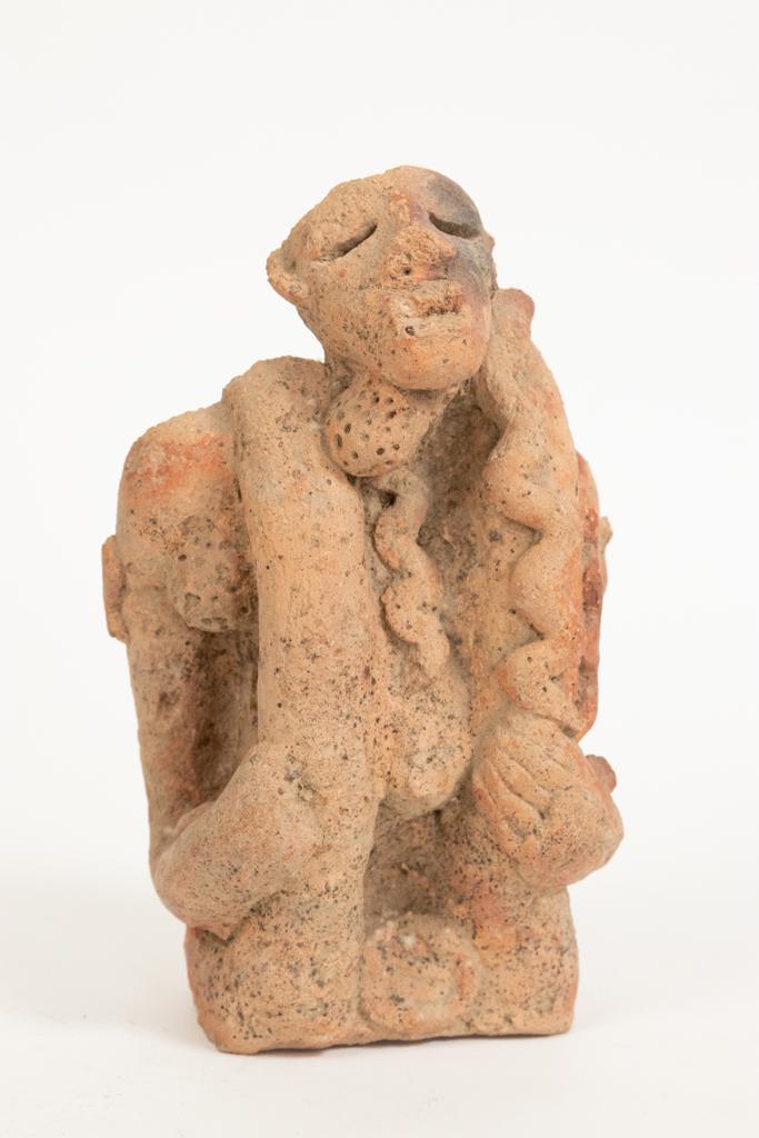 DJENNE CULTURE, MALI, AFRICAN TERRACOTTA SULPTURE, H: DJENNE CULTURE, MALI, AFRICAN TERRACOTTA SULPTURE, H 8", W 5.5", D 4", BLIND CONTORTIONIST Estate of Jack Faxon, Birmingham, MI. Michigan Senator and creator of the Michigan Council for the Arts.
