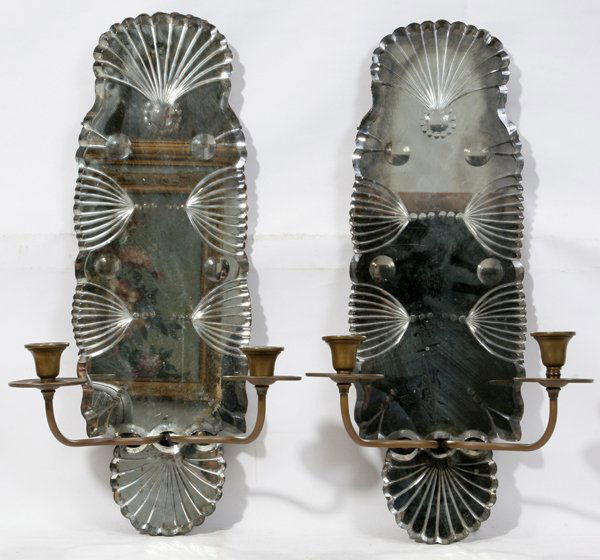 ART DECO TWO-LIGHT MIRRORED SCONCES, PAIR,: ART DECO TWO-LIGHT MIRRORED SCONCES, PAIR, 22" X 8":Each having a mirrored back and mounted with two metal candle arms. Measures 22 1/2" x 7 3/4". Not electrified.