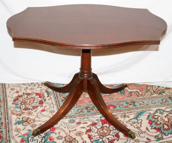 DUNCAN PHYFE MAHOGANY COFFEE TABLE H 18", L 27": DUNCAN PHYFE MAHOGANY COFFEE TABLE, H 18", L 27":Circa 1940. Pedestal base.