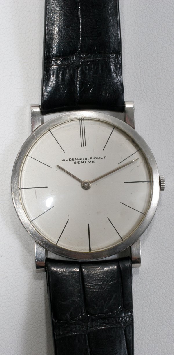 AUDEMARS PIQUET PLATINUM GENT'S WRIST WATCH: AUDEMARS PIQUET PLATINUM GENT'S WRIST WATCH C 1960:Leather strap. Appraised by Fredrick Jewelers, 869 West Long Lake Road, Bloomfield Hills, 48302 for $5305. in 2/06. Originally purchased from Jules S