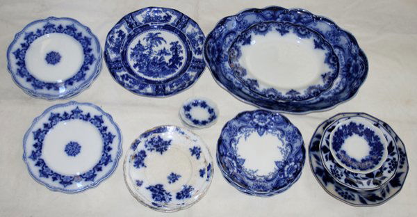 ENGLISH FLO BLUE EARTHENWARE PLATES & PLATTERS: ENGLISH FLO BLUE EARTHENWARE PLATES & PLATTERS, 24 PIECES:Late 19th to 20th c. Various makers and sizes (includes Johnson Brothers, W.H. Grindley, etc., many "Argyle" pattern pieces). Includes: 1 larg