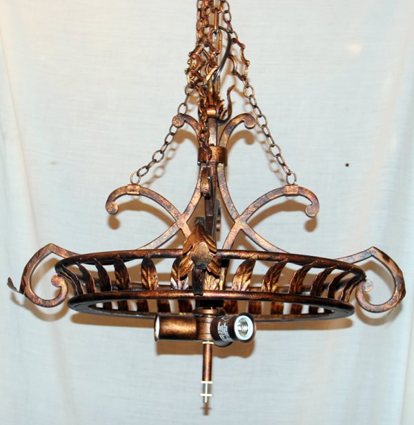 ITALIAN ANTIQUED BRONZE PATINA CHANDELIER H 18": ITALIAN ANTIQUED BRONZE PATINA THREE LIGHT CHANDELIER, H 18", DIA 25":Leafy motif, with frosted glass globe and leaf motif finial.