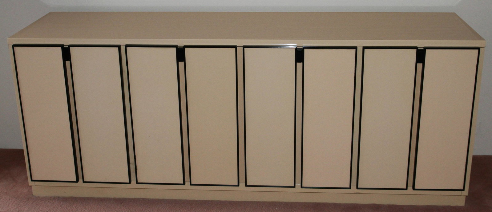 HENREDON FOUR PART LONG DRESSER H 28" L 72" D 19": HENREDON FOUR PART LONG DRESSER H 28" L 72" D 19" One cabinet with eight doors. "Circa 1990".From the Shore Club, St Clair Shores.