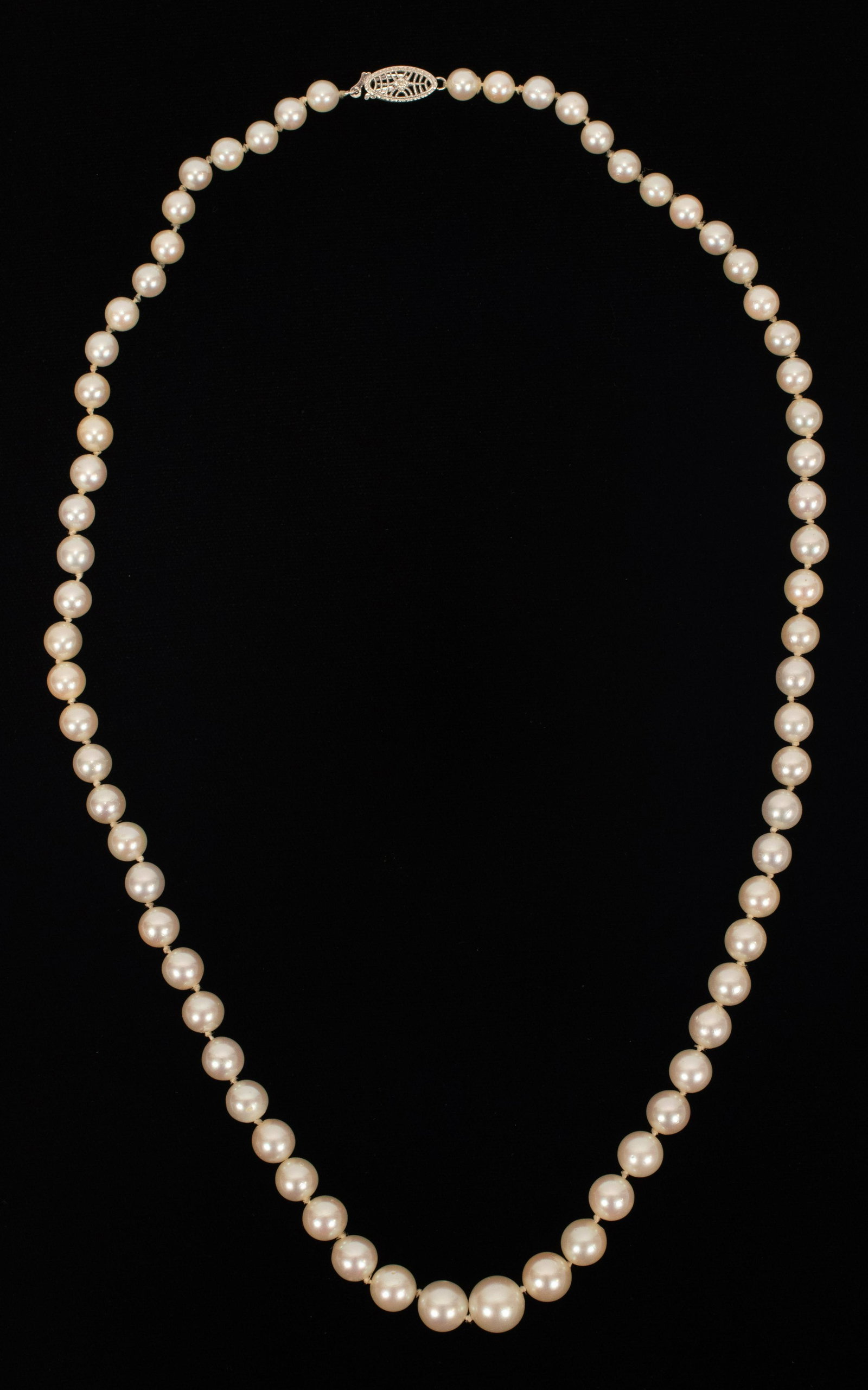GRADUATED CULTURED PEARL NECKLACE C. 1950 L 20": GRADUATED CULTURED PEARL NECKLACE C. 1950 L 20" Pearls graduated from 5 mm to 9 mm. TW 29g.14k yellow gold clasp. From the estate of Marsha Lanman, Hammond, IN