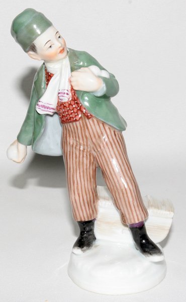 MEISSEN PORCELAIN BOY THROWING SNOWBALLS: MEISSEN PORCELAIN FIGURE, BOY THROWING SNOWBALLS, H 5 1/4":Blue under glaze crossed swords mark. Handwork Family Collection, Perrysburg, Ohio
