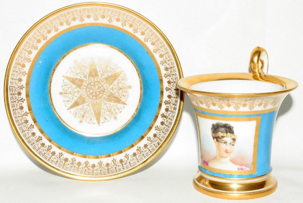 SEVRES PORCELAIN PORTRAIT CUP & SAUCER, 19TH C.: SEVRES PORCELAIN PORTRAIT CUP & SAUCER, 19TH C.:Hand painted cup with saucer, mid blue and fired gold. In red at the underside "M. Imp le de Sevres" (see photo). Handwork Family Collection, Perrysburg