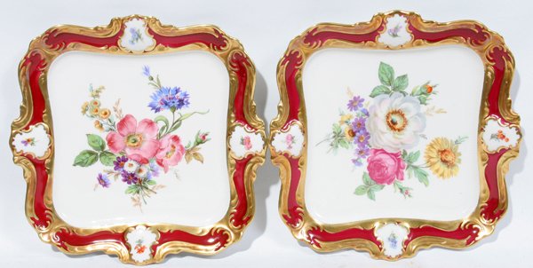 LINDNER BAVARIAN PLATES, PAIR, C. 1960, W 8": LINDNER BAVARIAN PLATES, PAIR, C. 1960, W 8":Each porcelain plate having a burgundy border, W.8 1/2" square. Floral center. Gilt borders. Garden flowers are different on each plate. Circa 1960.