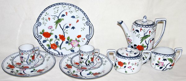 NORITAKE PORCELAIN CHOCOLATE SET, 10 PCS, : NORITAKE PORCELAIN CHOCOLATE SET, TEN PIECES, L 4" - 8":Including 2 cups, 2 saucers, 2 dessert plates, 1 cake plate, 1 creamer, 1 covered sugar and 1 chocolate pot. Each has a bird and floral motif in