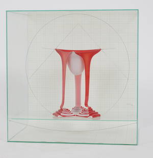 SYDNEY CASH (AMERICAN B. 1941) GLASS SCULPTURE: SYDNEY CASH (AMERICAN B. 1941) GLASS SCULPTURE SUSPENDED ON WIRE, 1981, H 11" W 12" DIA 6" Magenta and milk glass fusion, in a glass case. Signed and dated (81) on the graph paper background. Estate