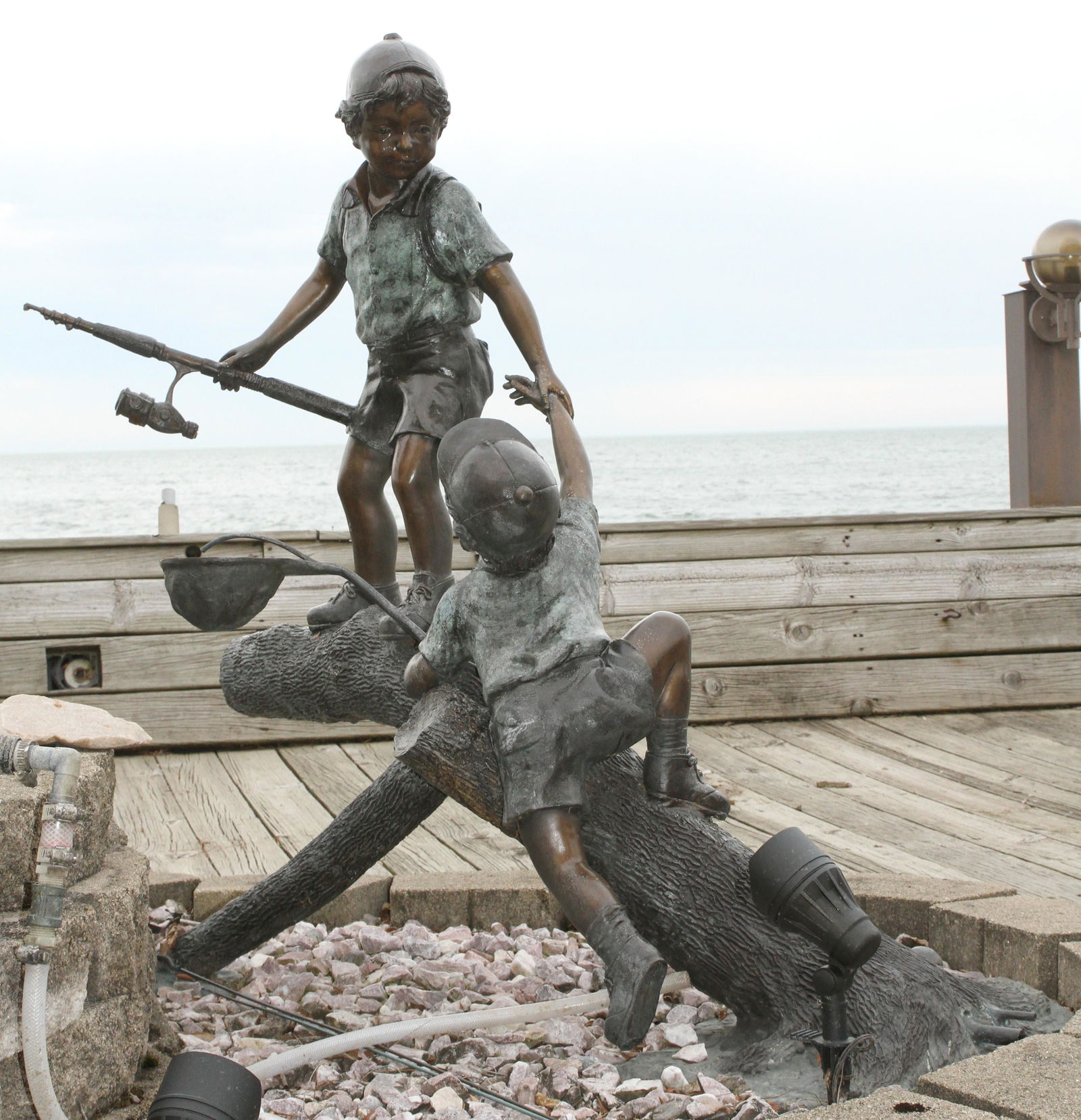 BRONZE GARDEN SCULPTURE, H 48", W 57", CHILDREN FISHING (1 of 8)