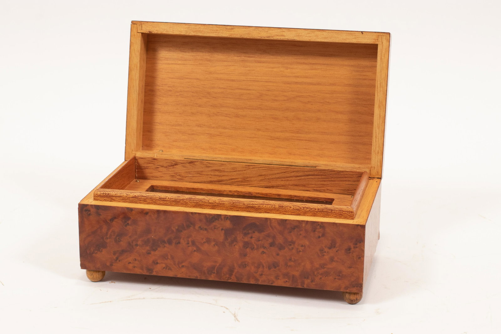 CUENDET SWISS MUSIC BOX, BURL WOOD H 3" L 8": CUENDET SWISS MUSIC BOX, BURL WOOD H 3" L 8" Inlaid scene on cover depicting Alps, lake scene and boat. From a Hubbard Lake, Mi. private collection.