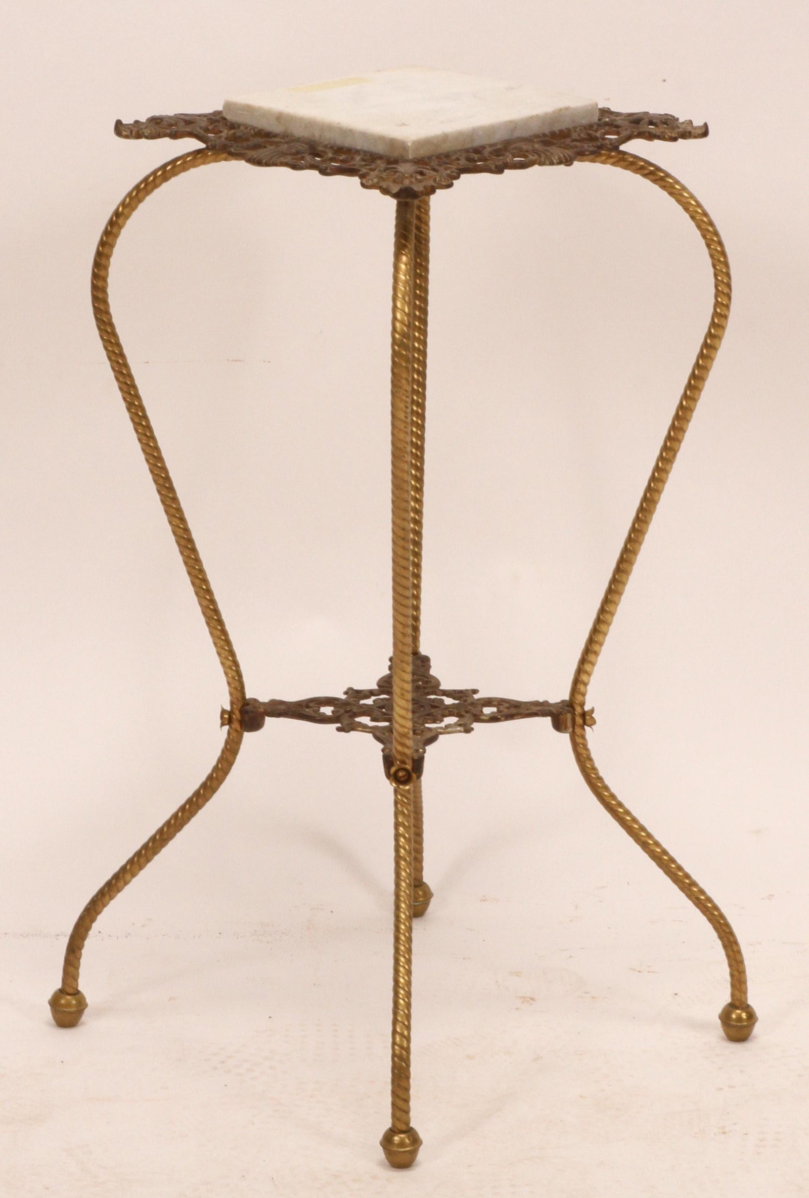 BRASS PEDESTAL WITH INSET MARBLE TOP EARLY 20TH C.. H: BRASS PEDESTAL WITH INSET MARBLE TOP EARLY 20TH C.. H 30" W 13" D 13" Pierced gallery, four cabriole legs with center pierced stretcher. Provenance: Estate of Jack Faxon, Michigan Senator and creator 