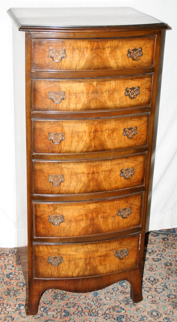 EDWARDIAN WALNUT SIX-DRAWER CHEST, H 47", W 21": EDWARDIAN WALNUT SIX-DRAWER CHEST, H 47", W 21", D 18 1/2":Slightly bowed front.