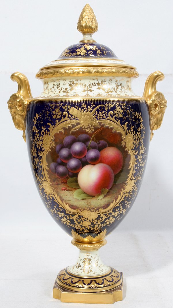 COALPORT PORCELAIN VASE H 16", SIGNED F. HOWARD: COALPORT PORCELAIN VASE, H 16", SIGNED F. HOWARD:Reserve of hand painted fruit on front exquisitely painted and signed by F. Howard. Cobalt ground. Back panel with exquisite design of flowers in raise