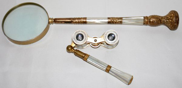 OPERA GLASSES & PARASOL HANDLE MAGNIFYING GLASS: MOTHER-OF-PEARL OPERA GLASSES & VICTORIAN PARASOL HANDLE MAGNIFYING GLASS, L 15 1/2":Including a pair of mother-of-pearl opera glasses retailed by Smith Sturgeon Co. of Detroit and a Victorian mother-