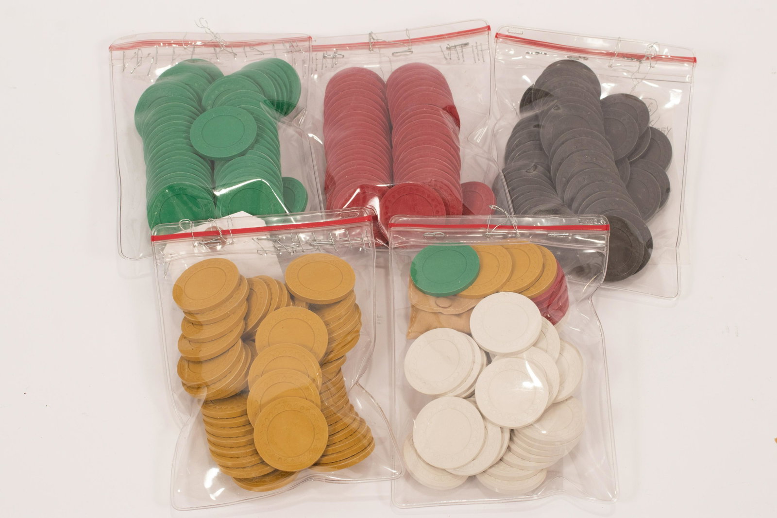 U.S ACRYLIC BAKELITE POKER CHIPS 1950-1960 OVER (210) +: U.S ACRYLIC BAKELITE POKER CHIPS 1950-1960 OVER (210) + Celuloid, Bakelite, Plastic Poler Chips. (45) Yellow,(45) Red; (45)Green; (45) Dk-Grey and (32) White Chips. Over (210) +. Dia 1 1/2"