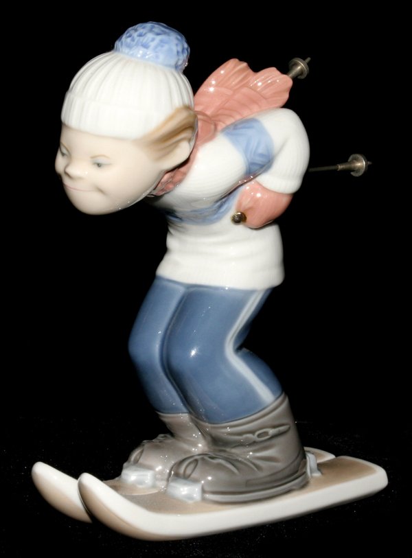 LLADRO PORCELAIN FIGURE, 'SKIER PUPPET' (4970): LLADRO PORCELAIN FIGURE, 'SKIER PUPPET' (4970), H 7":Number 4970, with metal poles, H.7 1/4". Handwork Family Collection, Perrysburg, Ohio