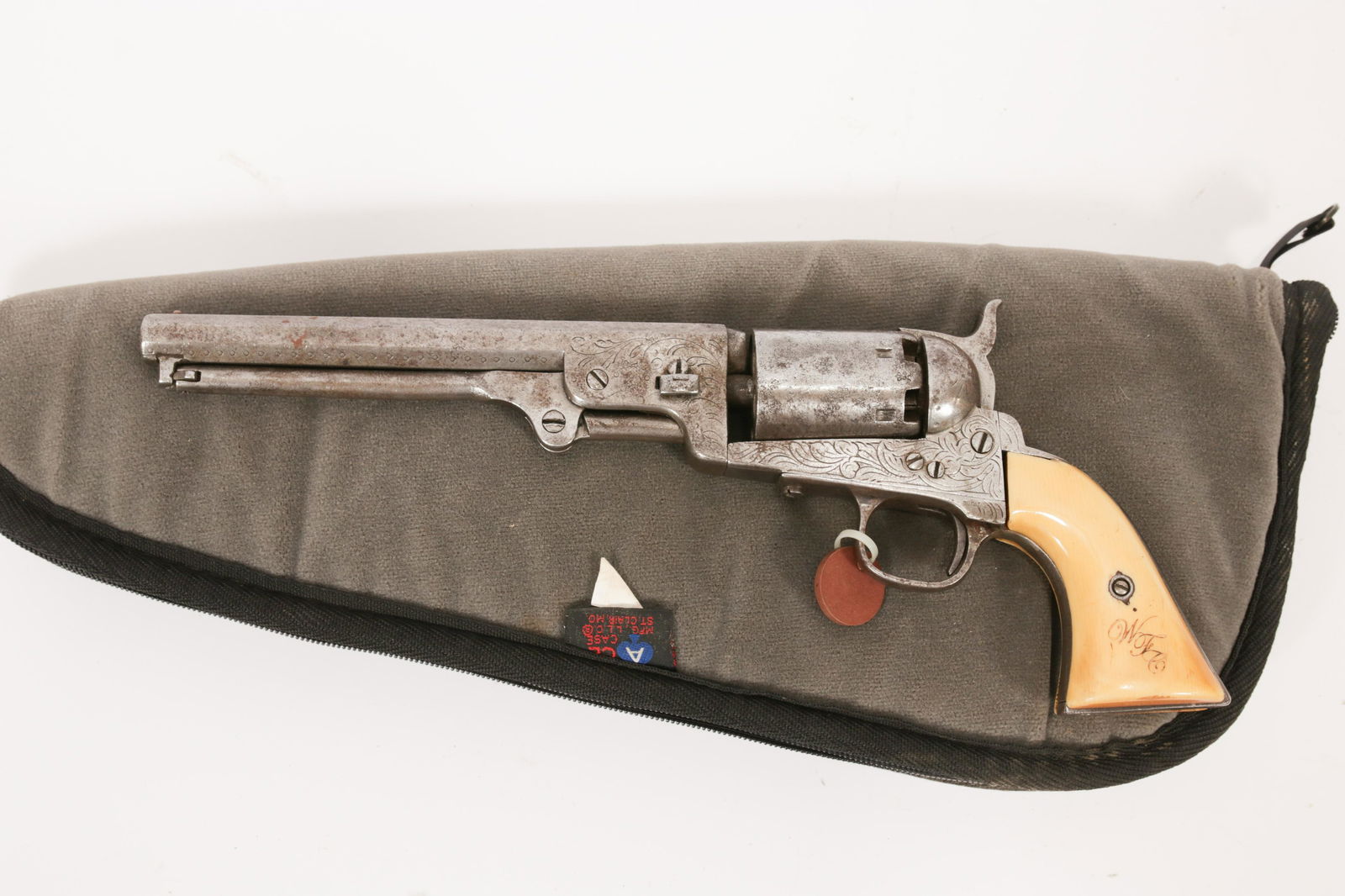 CLEMENT ARMS CO. M1851 SINGLE ACTION PERCUSSION CAP: CLEMENT ARMS CO. M1851 SINGLE ACTION PERCUSSION CAP REVOLVER, .38 CAL., C. 4TH QUARTER 19TH C., L 7 1/4" BARREL, "TO BUFFALO BILL...", SN 111318 Having bone grips engraved with "W.F.C." (William Frede