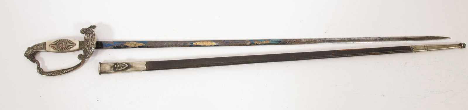 GERMAN BAVARIAN DIPLOMAT'S SWORD WITH SILVER MOUNTS AND: GERMAN BAVARIAN DIPLOMAT'S SWORD WITH SILVER MOUNTS AND MOTHER OF PEARL GRIPS, C. MID 19TH C., L 37 1/4" OVERALL 5/8 blued steel with gilt engraving. Floral decorations with crossed arms and "In Treue