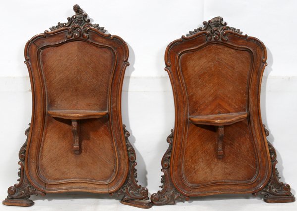 COUNTRY FRENCH, HANGING CANDLE SHELVES, C1900: COUNTRY FRENCH, HANGING CANDLE SHELVES, MAHOGANY, C1900, PAIR, H 20", W 15":having violin shape panels with carved crest, outer edges and acanthus leaf designs; small candle shelf on each panel with c
