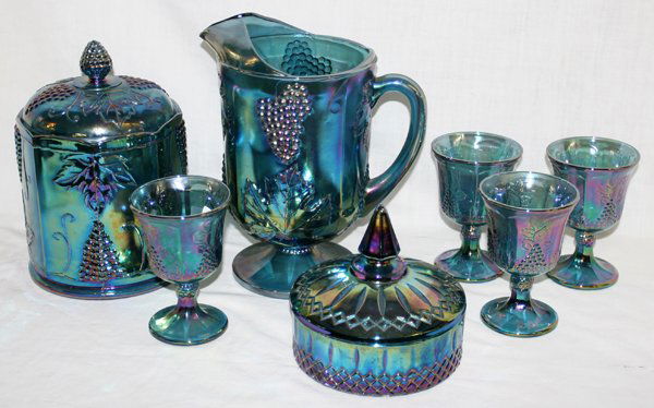 CARNIVAL GLASS PITCHER, GOBLETS, CANDY DISH, 7: CARNIVAL GLASS PITCHER, GOBLETS, CANDY DISH, BISCUIT JAR 7 LOT, H 10", 9",6", DIA 6":4 Goblets H6". Covered candy dish H6", Dia 6".