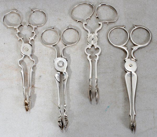 ENGLISH STERLING SUGAR NIPPERS (4) EARLY 20TH C: ENGLISH STERLING SUGAR NIPPERS (4), ANTIQUE-EARLY 20TH C., L 4 1/2":Scissor style sterling silver sugar nippers/tongs, each having relatively straight arms, three with shell bowls and one with spade-l