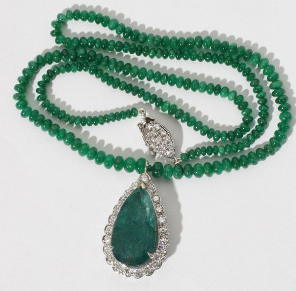 13.50 CT. EMERALD & 1.50 CT. DIAMOND PENDANT,: 13.50 CT. EMERALD & 1.50 CT. DIAMOND PENDANT, L 1" PENDANT, 18" NECKLACE:Strung on emerald bead necklace. Diamonds H-color, Si-1 clarity. 14kt white gold. Total weight 18.9 grams.
