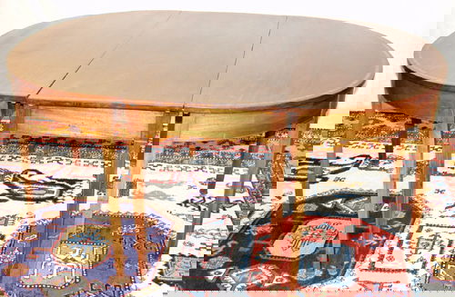 ANTIQUE MAHOGANY DINING TABLE: ANTIQUE MAHOGANY DINING TABLE, CIRCA 1820, H 28", W 49", L 103 1/2":In three parts, rectangular center flanked by demi-lune ends, each piece raised on squared, tapering legs. Plus two leaves.